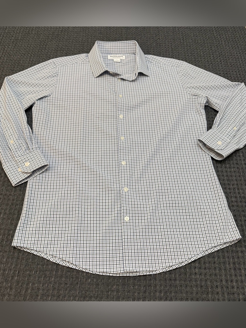 Mizzen + Main blue checkered button front long sleeve shirt.